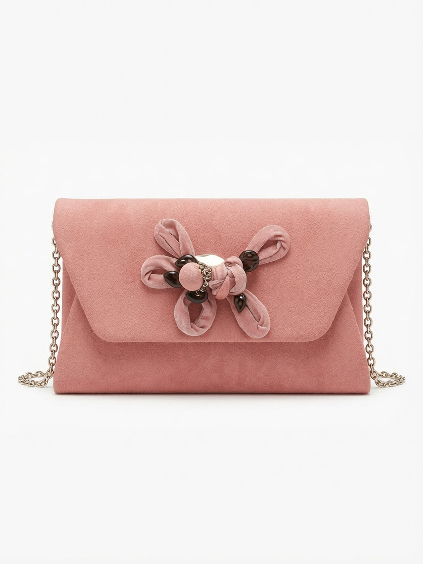 Pink velvet clutch with floral decor