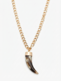 Gold-toned necklace with a chunky fang pendant