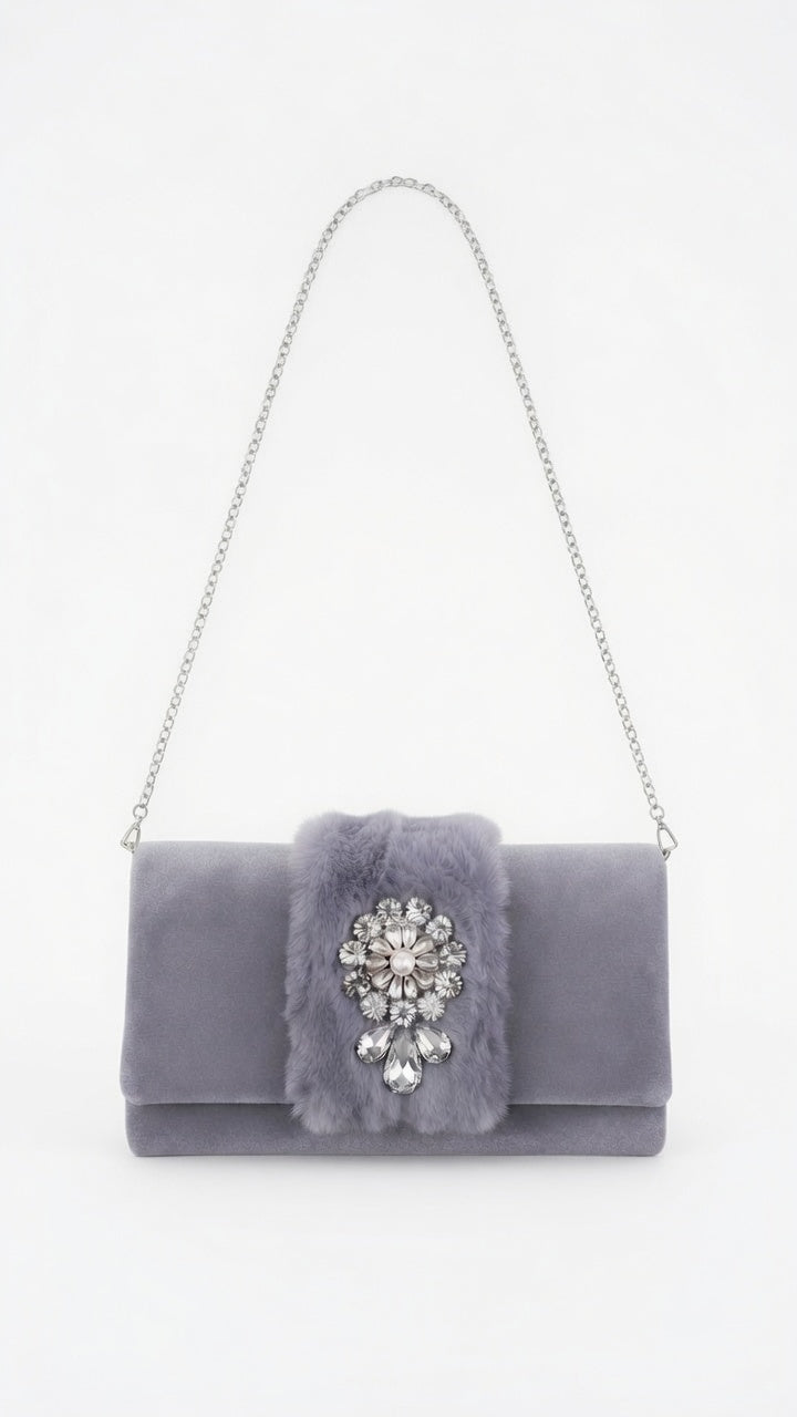 Gray velvet clutch with a fur insert and a crystal brooch