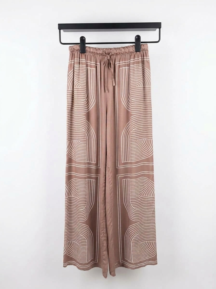 Wide-leg trousers with a geometric print — Italy,